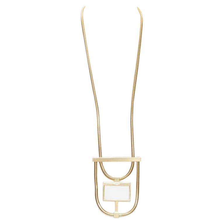 SAINT LAURENT Hedi Slimane Collier pendentif géométrique en opium blanc