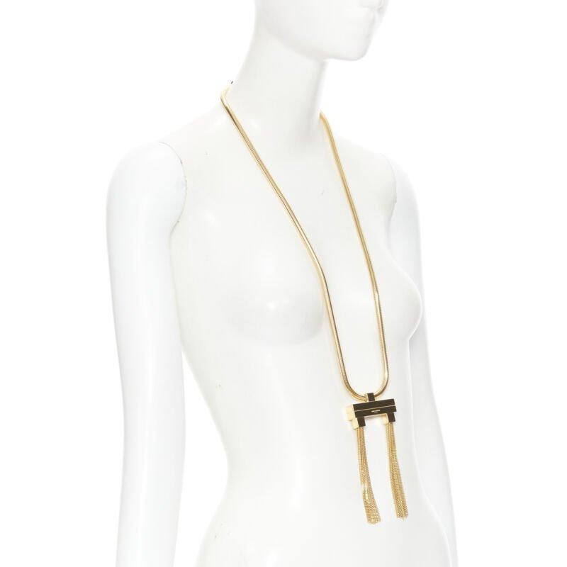 SAINT LAURENT Hedi Slimane Collier Runway Opium Deco à double pompon en or Pour femmes en vente