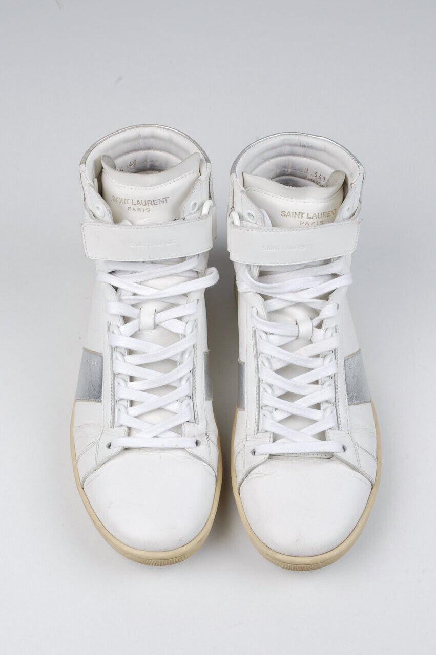 Item for sale is 100% genuine Saint Laurent Hi-Top Sneakers
Color: White
(An actual color may a bit vary due to individual computer screen interpretation)
Material: Leather
Tag size: EUR 40
These shoes are great quality item. Rate 8.5 of 10, very