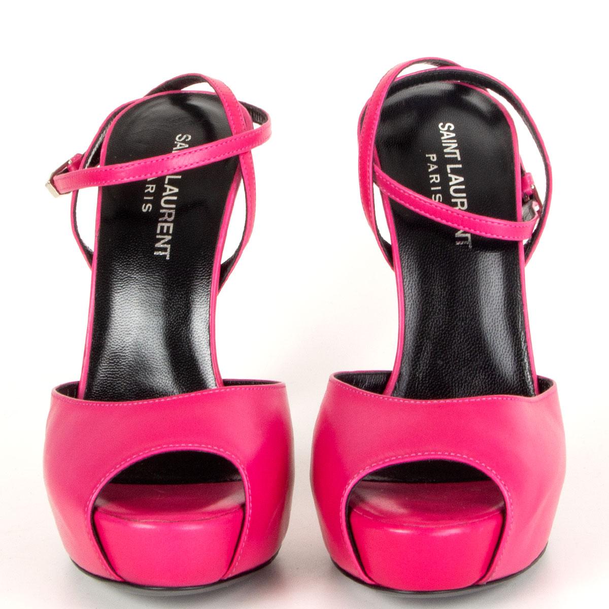 authentic Saint Laurent Debbie open-toe ankle-strap sandals in magenta calfskin. Brand new. Come with dust bag.

Imprinted Size 37
Shoe Size 37
Inside Sole 24cm (9.4in)
Width 7cm (2.7in)
Heel 13cm (5.1in)
Platform 2.5cm (1in)
