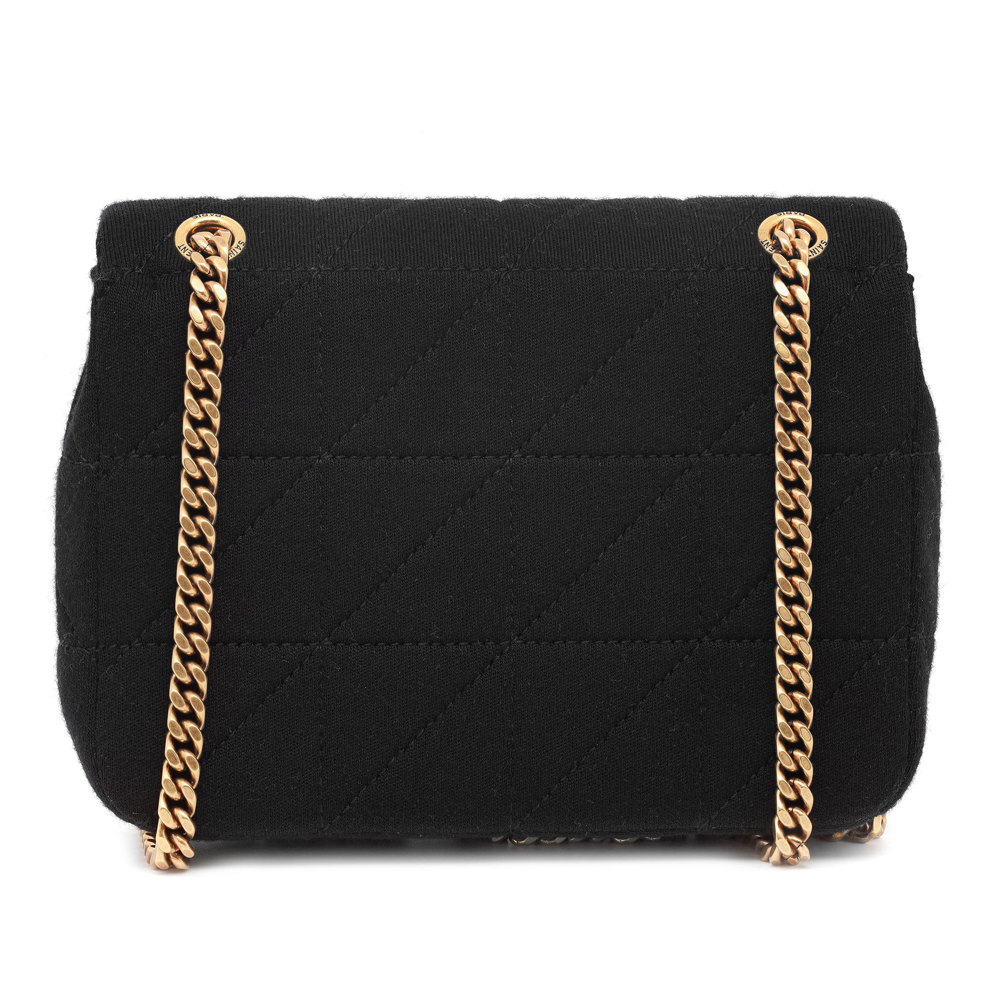 Saint Laurent Jamie crossbody mini bag in quilted wool. Color: Black. Sliding adjustable chain crossbody strap, can be doubled. Flap top with YSL logo hardware. One main interior compartment with one slip pocket. Aged gold tone hardware.
