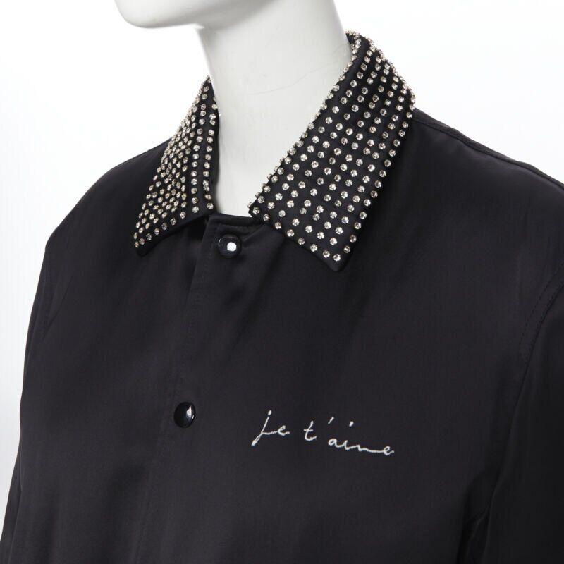 SAINT LAURENT Je T'aime Teddy black satin crystal collar bomber jacket FR34
Reference: TGAS/A05625
Brand: Saint Laurent
Designer: Anthony Vaccarello
Model: Teddy jacket
Material: Viscose
Color: Black
Pattern: Solid
Closure: Snap Buttons
Extra