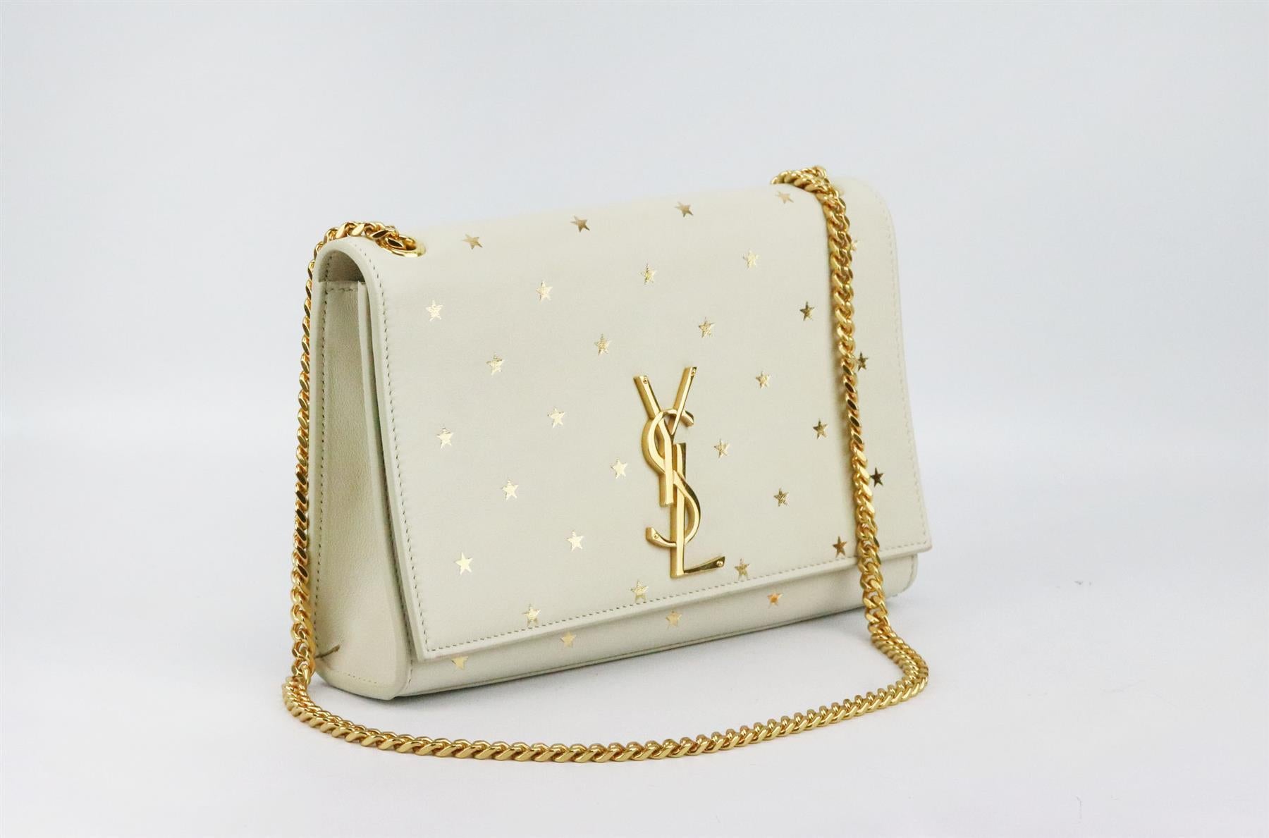 This 'Kate Monogramme' bag by SAINT LAURENT will suit almost any occasion, embellished with the signature 'YSL' plaque, it's been crafted in Italy from soft star-printed leather and has a durable chain strap that can be adjusted for a shorter drop.