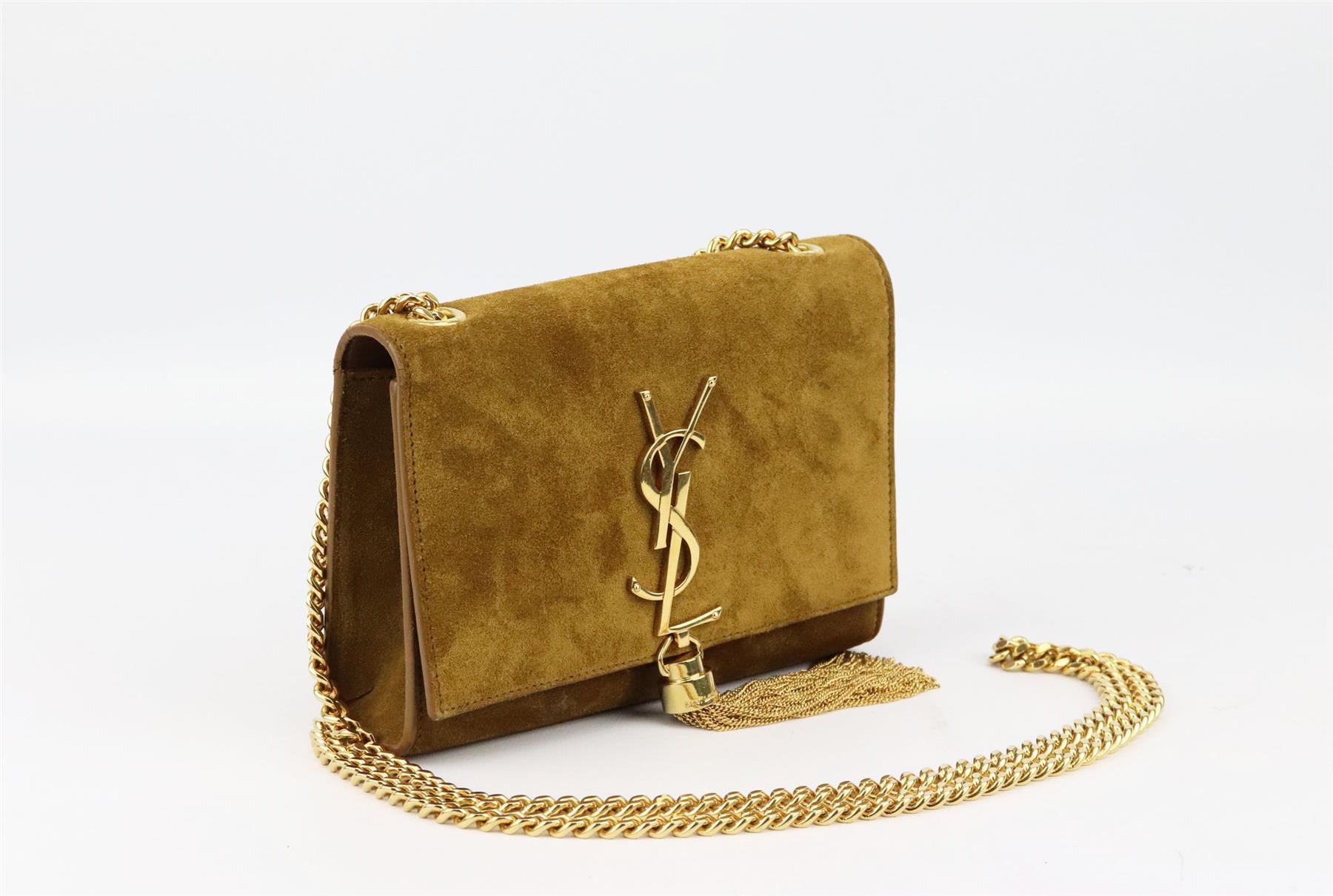 This 'Monogramme' bag by SAINT LAURENT will suit almost any occasion, embellished with the signature tassel-tipped 'YSL' plaque, it's been crafted in Italy from soft suede and has a durable chain strap that can be adjusted for a shorter drop. Tan