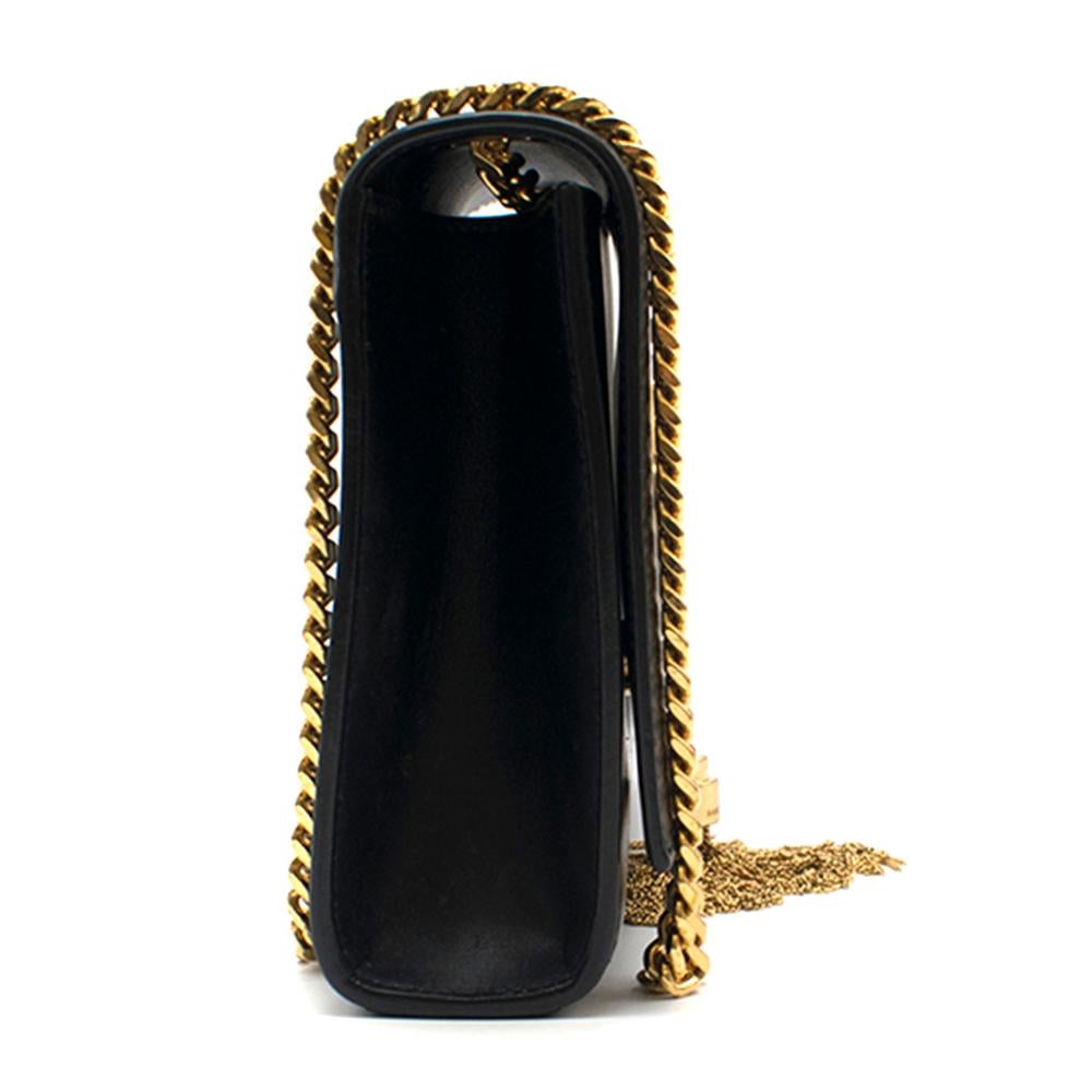 Saint Laurent Kate Tassel Small Shoulder Bag
Dust bag included 

Black leather, 
Saint Laurent's Kate Tassel crossbody bag 
Gold snap clasp closure
Wallet-style interior 
Card slots
Iconic YSL hardware  Swinging tassel golden tone.  Removable