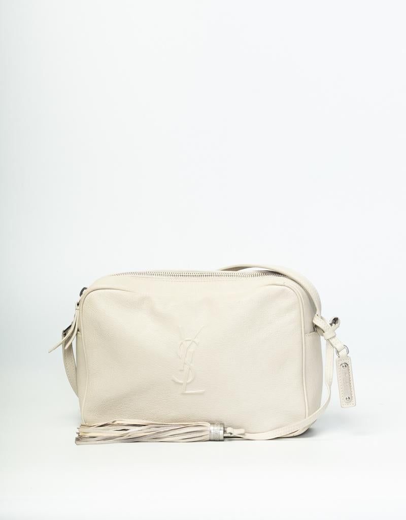 Inspired by vintage camera bags, this crossbody bag is made from smooth and supple lambskin leather in ice white. Featuring sliver a cross body strap, silver hardware, black grosgrain lining and an interior patch pocket.

COLOR: Icy white
MATERIAL: