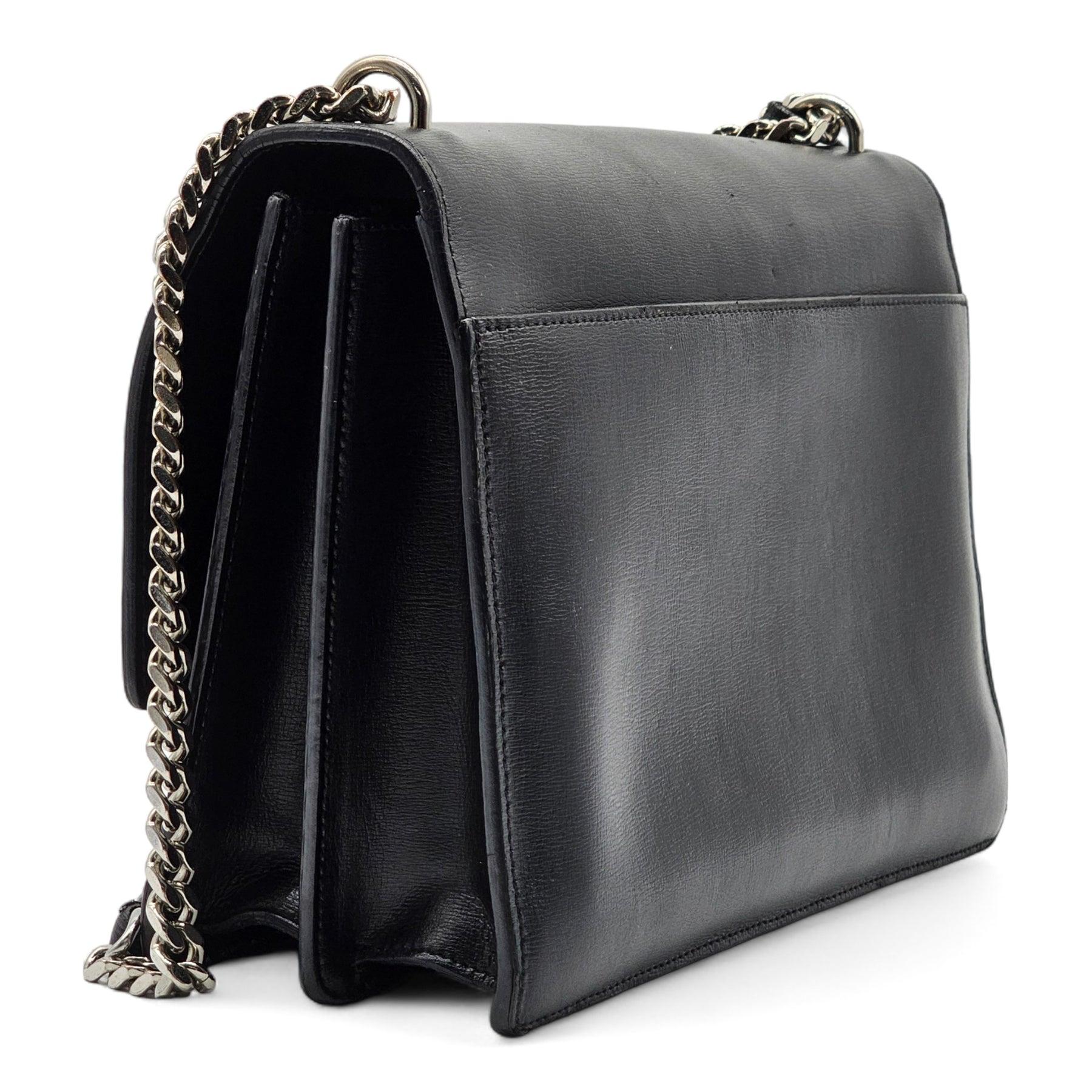 Saint Laurent Large Sunset Leather Shoulder Bag in Black.

Additional information:
Material: Calfskin leather
Silver hardware
Chain strap with leather tab
YSL logo on the front
Color: Black
Dimension: 10.5