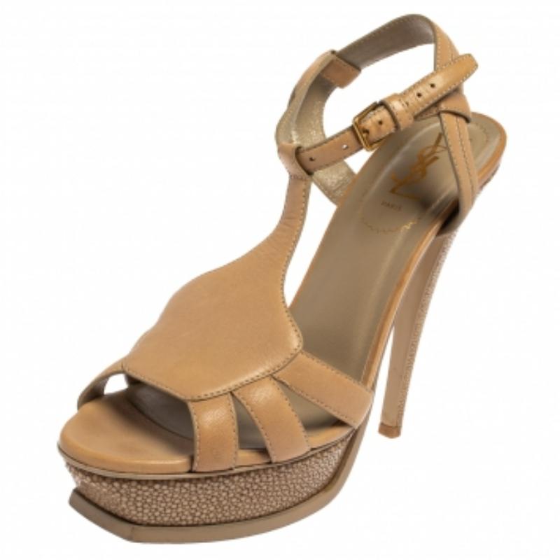 One of the most sought-after designs from Saint Laurent is these smart and sophisticated sandals. They are such a craze amongst fashionistas, and it is time you own one yourself. These beige ones are designed from leather, ankle fastenings, and 14