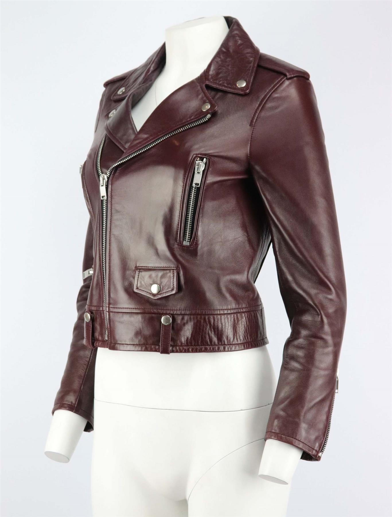 This jacket by Saint Laurent is a cool iteration has been crafted in Italy from burgundy leather and cut for a slim fit, it has all the signature details you would expect, like epaulets and zipped cuffs. Burgundy leather (Lambs). Asymmetric zip