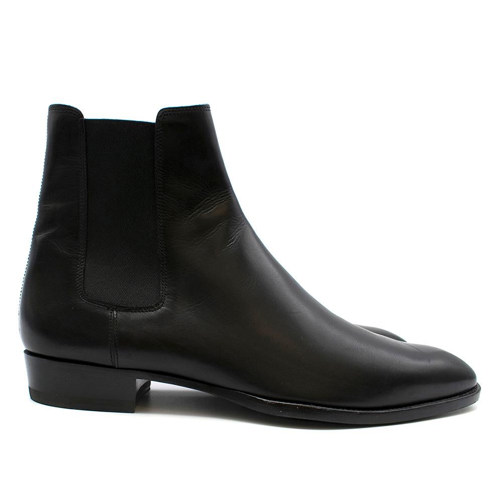 Saint Laurent Leather Chelsea boots 

Elastic panels
Stacked heel
Leather sole
Patent leather interior
Back pull on tabs

Please note, these items are pre-owned and may show some signs of storage, even when unworn and unused. This is reflected