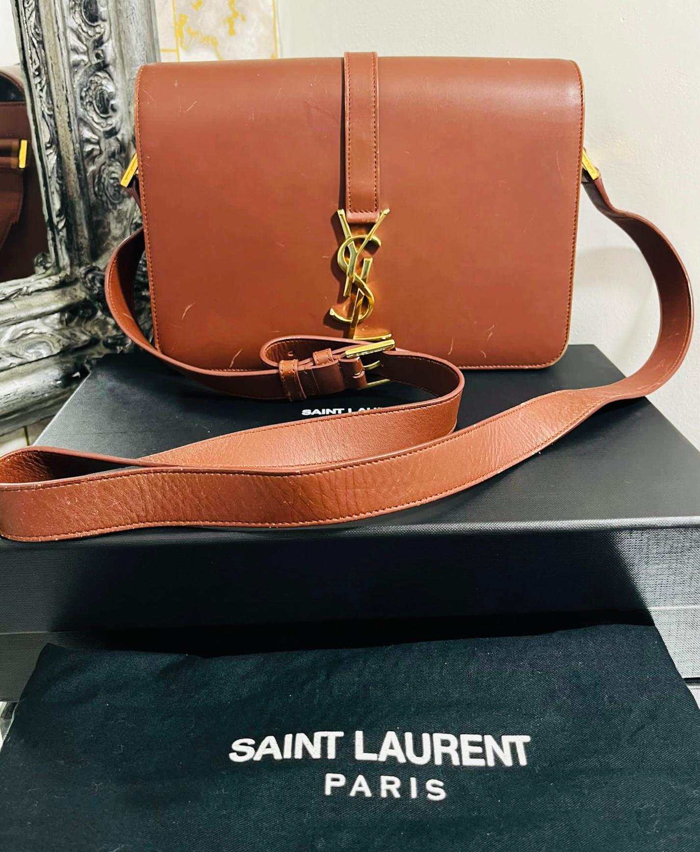 Saint Laurent Leather Cross-Body Bag

Brown 'Universite' structured bag detailed with gold 'YSL logo to the front.

Designed with flap, magnetic closure and adjustable, detachable leather shoulder strap.

Featuring suede interior with zipped