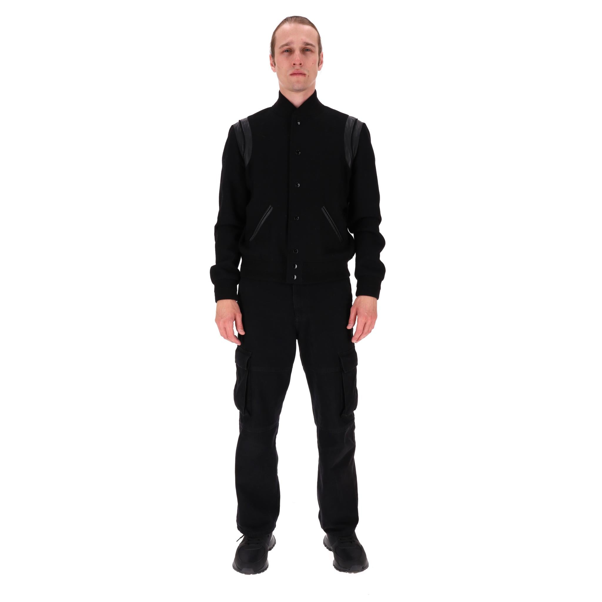 Saint Laurent Leather Trimmed Wool Teddy Bomber Jacket

From 2022 Collection is this black bomber jacket fully crafted from wool and detailed with tonal leather trim.

Featuring press-stud fastening, side pockets and ribbed collar.

Rrp Approx.