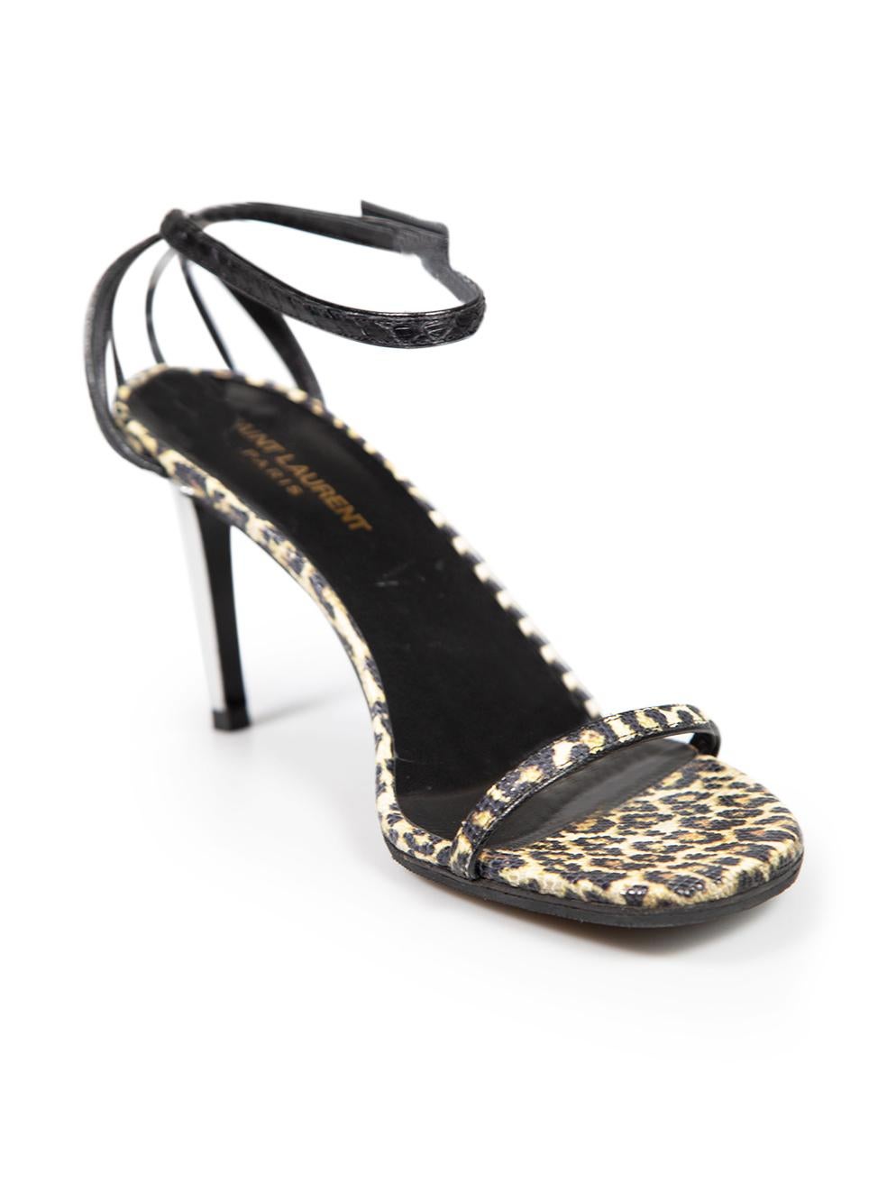 CONDITION is Very good. Minimal wear to sandals is evident. Minimal scratches to both heels and on the insoles of the shoes. Overall peeling to the shoe strap and loose threads on the left shoe strap. Please note that the shoes have been resoled on