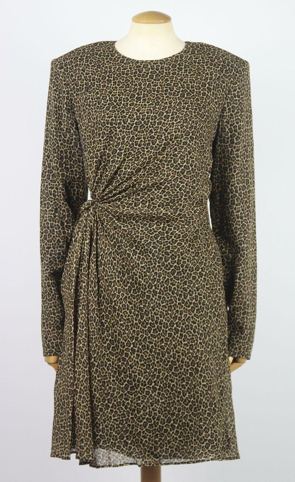 This leopard-printed dress serves as a natural extension of Saint Laurent's signature after-dark glamour, made from fine virgin wool that is almost sheer, the mini piece comes lined with a black slip and comes gathered at one side, adding definition