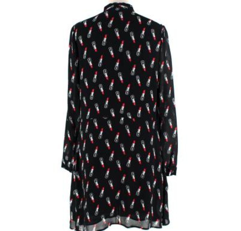 Saint Laurent Black Crepe Lipstick Print Dress

- Fluid, lightweight black crepe with illustrative lipstick print
- Lavaliere self-tie neck
- Long sleeve, button finished cuff
- Short length, with movement through the bodice and