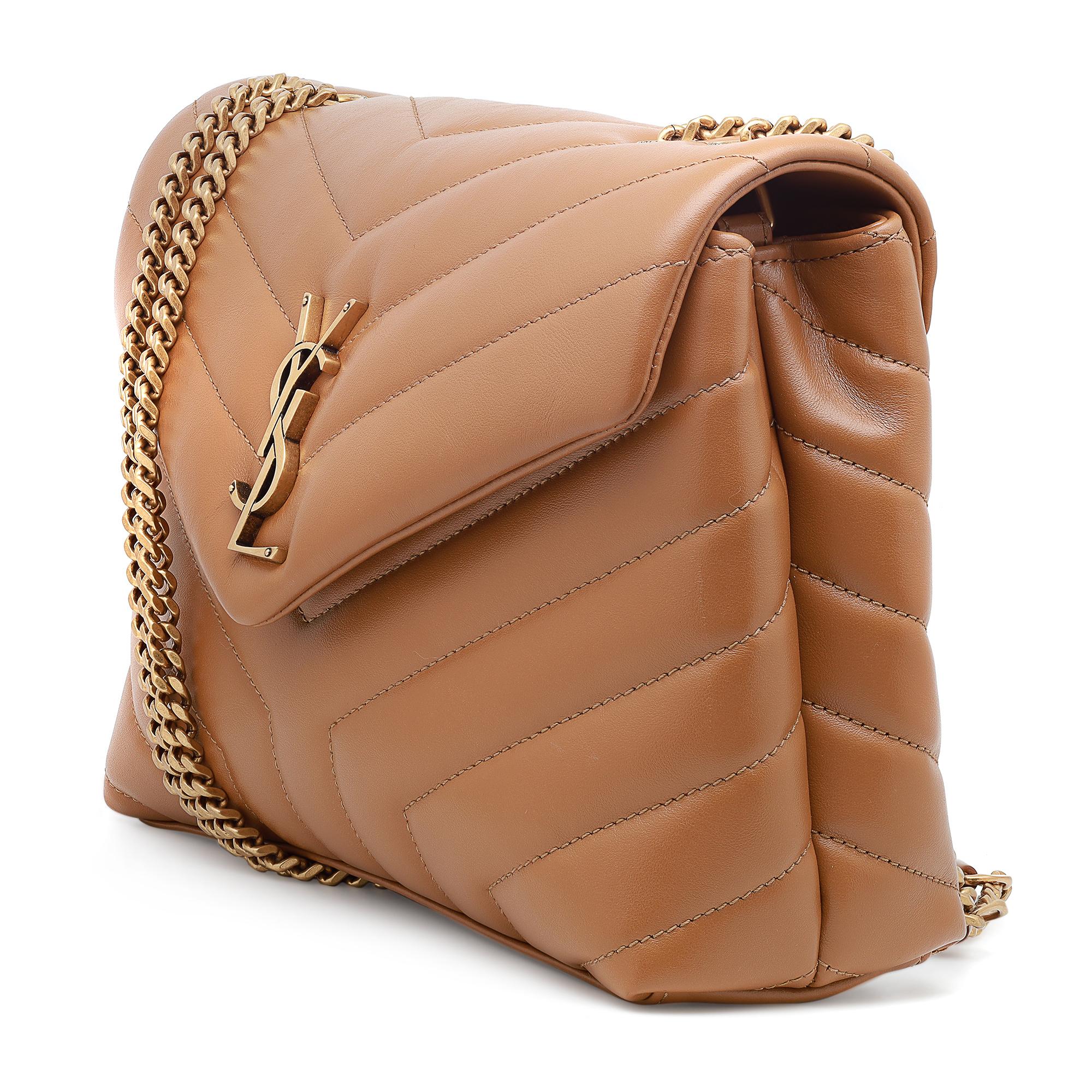 Saint Laurent Loulou Small Quilted Leather Dark Natural Crossbody Bag. Featuring Quilted chevron leather with Logo hardware at the front. Gold tone hardware. Adjustable crossbody strap. The strap can be worn single or doubled. Magnetic flap closure.