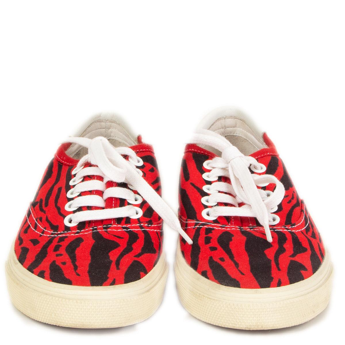 100% authentic Saint Laurent Skate low-top sneakers in red and black zebra printed canvas and white leather lining. Featuring an off-white rubber sole. Have been worn and are in excellent condition.  

Measurements
Imprinted Size	37
Shoe