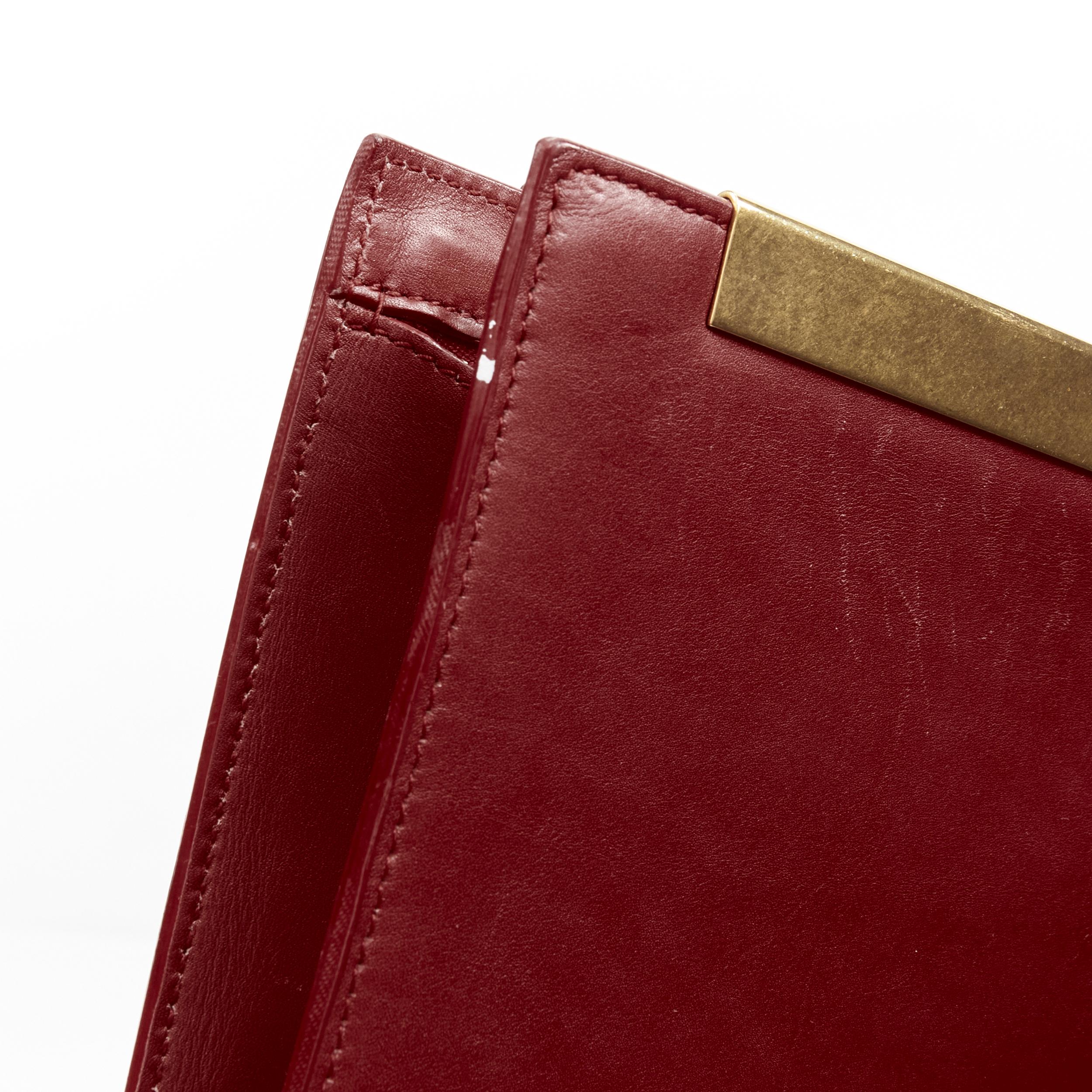 SAINT LAURENT Lutetia gold metal bar red leather rectangular clutch bag 1
