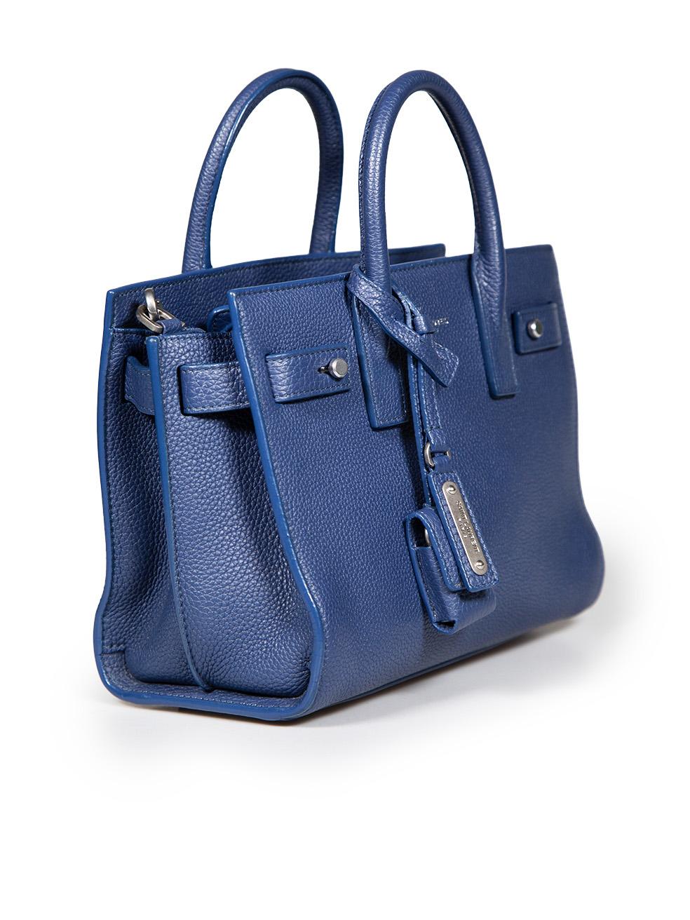 CONDITION is Very good. Minimal wear to bag is evident. Minimal wear to the bottom edge where there is a small scratch and some discolouration, slight tarnishing to the metal hardware and an abrasion to the shoulder strap handle can be seen on this