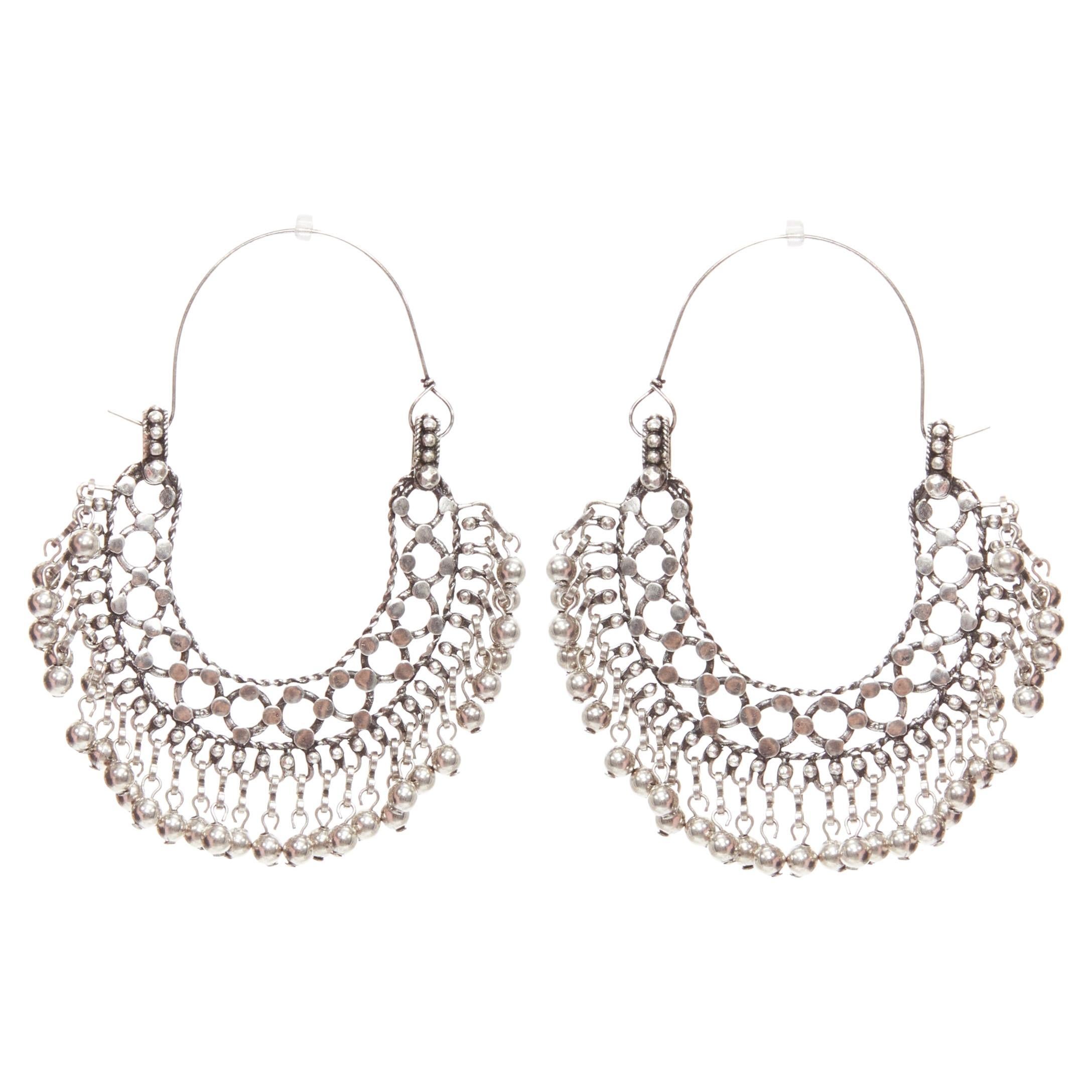 SAINT LAURENT Marrakech Folk dangling bells ethnic silver brass hoop earring