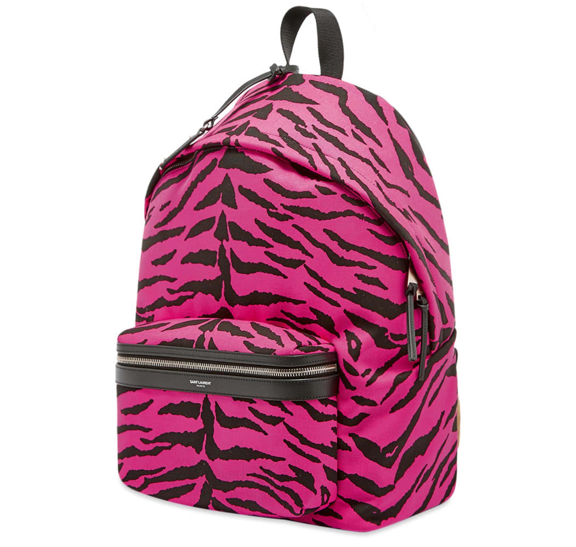 Saint Laurent Mens Pink & Black Zebra Print 'City' Backpack

Saint Laurent’s ever-popular City backpack heads into the wild and gets covered in zebra print for FW19. Sure to grab attention wherever you venture, this cotton-constructed iteration
