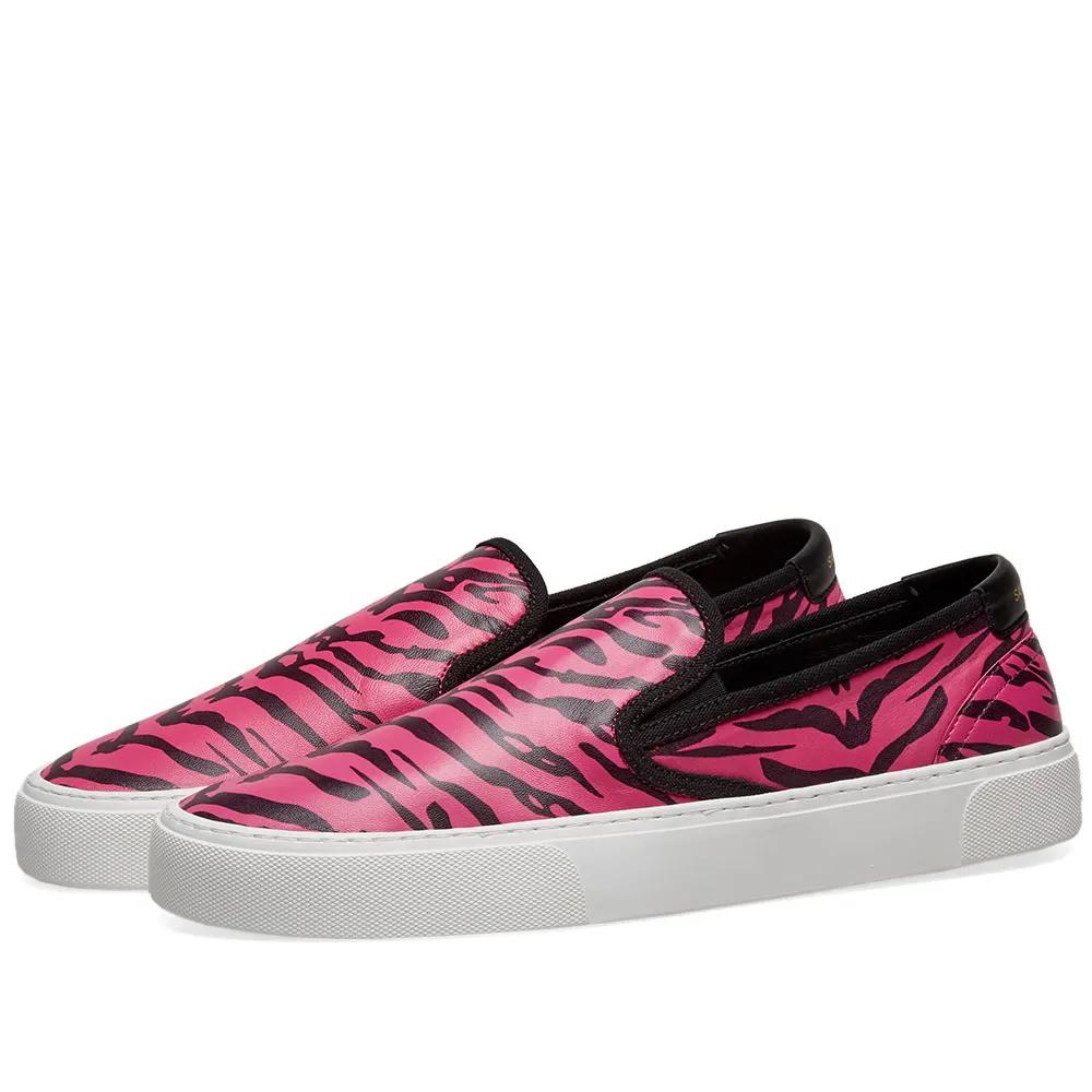 Saint Laurent Mens Venice Slip On Fuchsia Zebra Print Leather Sneaker

Walking on the wild side, Saint Laurent’s Venice slip on sneakers gets adorned in animal print for FW19. In eye-catching pink and black zebra, these all-over print sneakers will