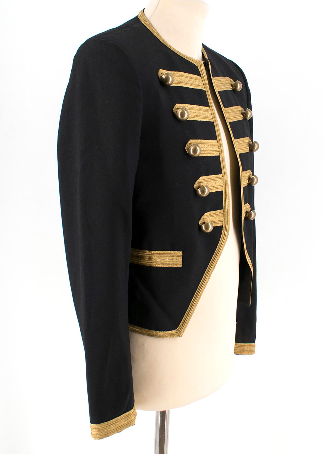 Saint Laurent Wool Officer Jacket With Gold Passementerie

Wool Officer Jacket with gold passementerie braiding, 
Jacket with gold braiding, 
Officer buttons, 
Padded shoulders, 
Silk lining, 
Two piped pockets, 
Two inside pockets,