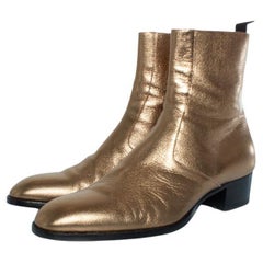 Saint Laurent, Metallic gold Wyatt boots