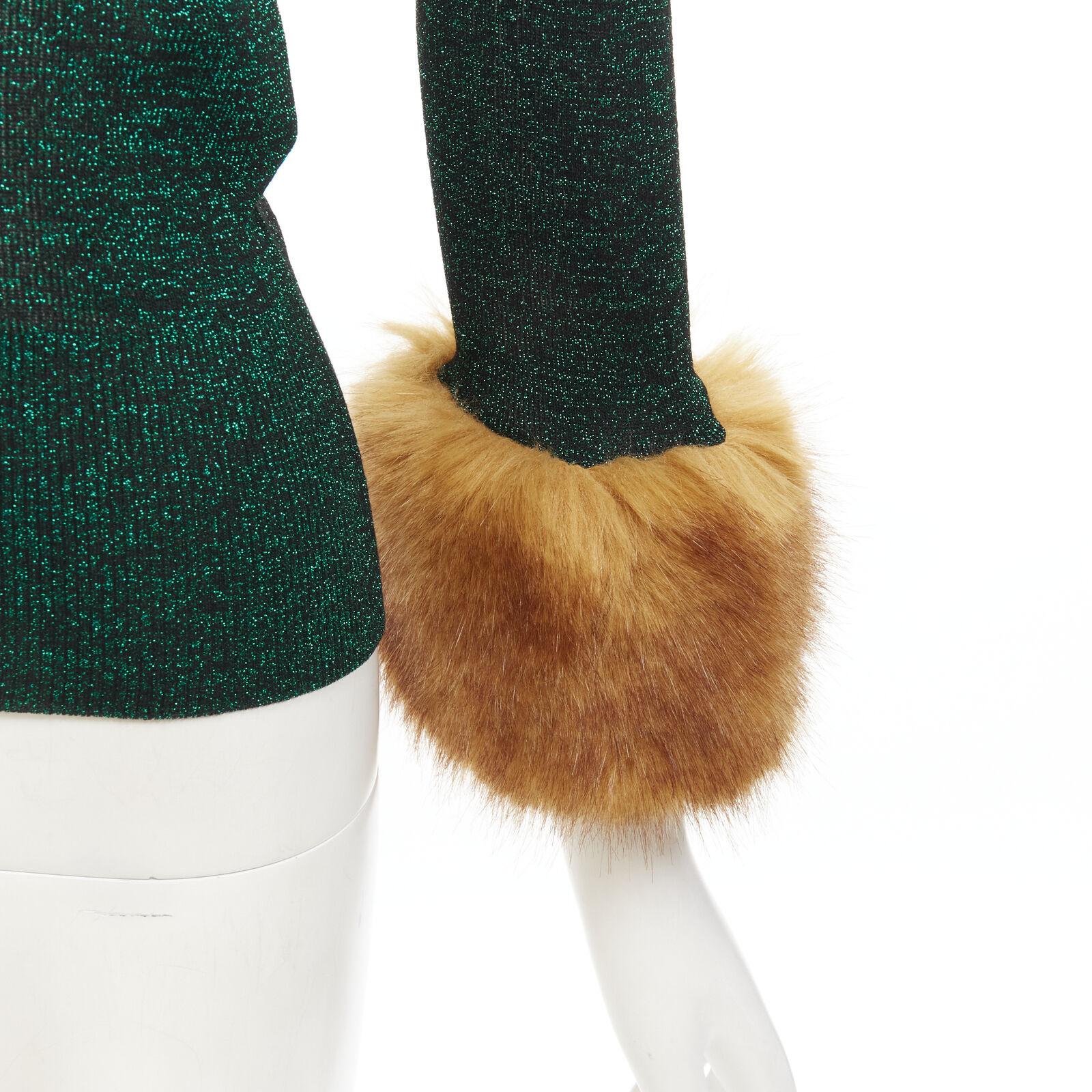 SAINT LAURENT metallic green lurex black faux fur trim ribbed top XS
Reference: AAWC/A00219
Brand: Saint Laurent
Designer: Anthony Vaccarello
Collection: 2021
Material: Viscose, Blend
Color: Green, Brown
Pattern: Solid
Extra Details: Ribbed knit.