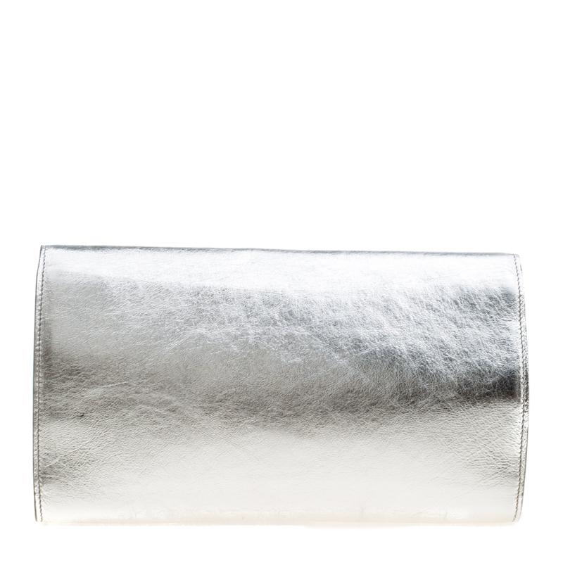 The Belle De Jour clutch by Saint Laurent is a creation that is not only stylish but also exceptionally well-made. It is a design that is simple and sophisticated, just right for the woman who embodies class in a modern way. Meticulously crafted