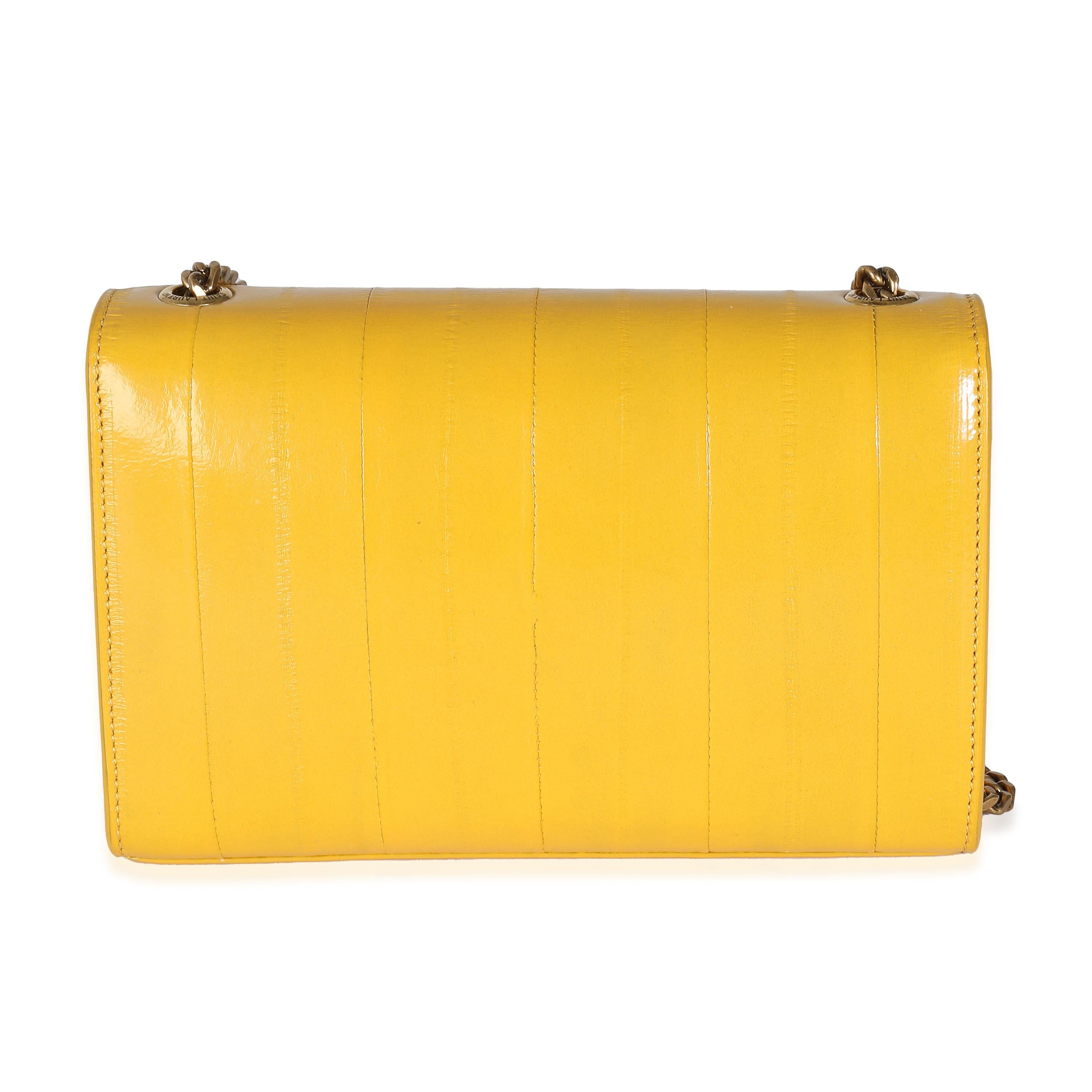 Listing Title: Saint Laurent Mimosa Yellow Eel Skin Small Kate Chain Bag
SKU: 139198
MSRP: 2400.00 USD
Condition: Pre-owned 
Handbag Condition: Pristine
Condition Comments: Item has no indication of wear. Please note: this item can not be shipped to