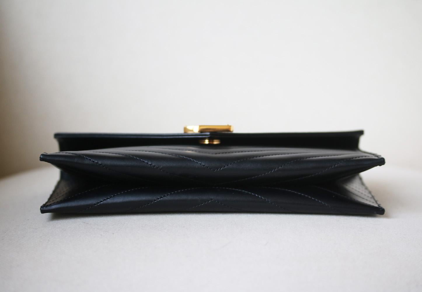 saint laurent monogram quilted leather clutch