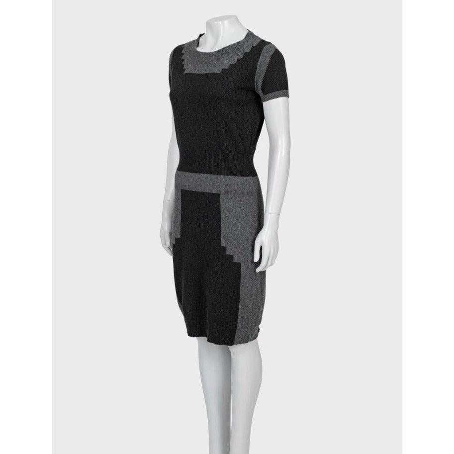 Elevate your wardrobe with this stunning Saint Laurent cashmere dress! This beautiful dress is new with the original tag attached.

No brand tag

Features:

- Brand: Saint Laurent

- Material: 100% Cashmere

- Size: M (runs small, please see