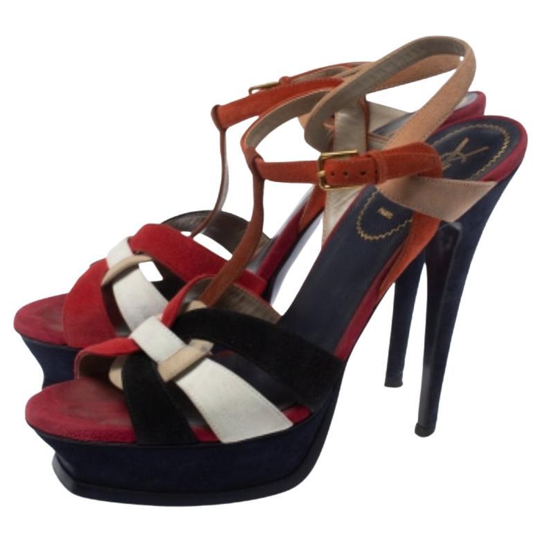 One of the most sought-after designs from Saint Laurent is their Tribute sandals. They are such a craze amongst fashionistas around the world, and it is time you own one yourself. These colorful ones are designed with suede straps, ankle fastenings,