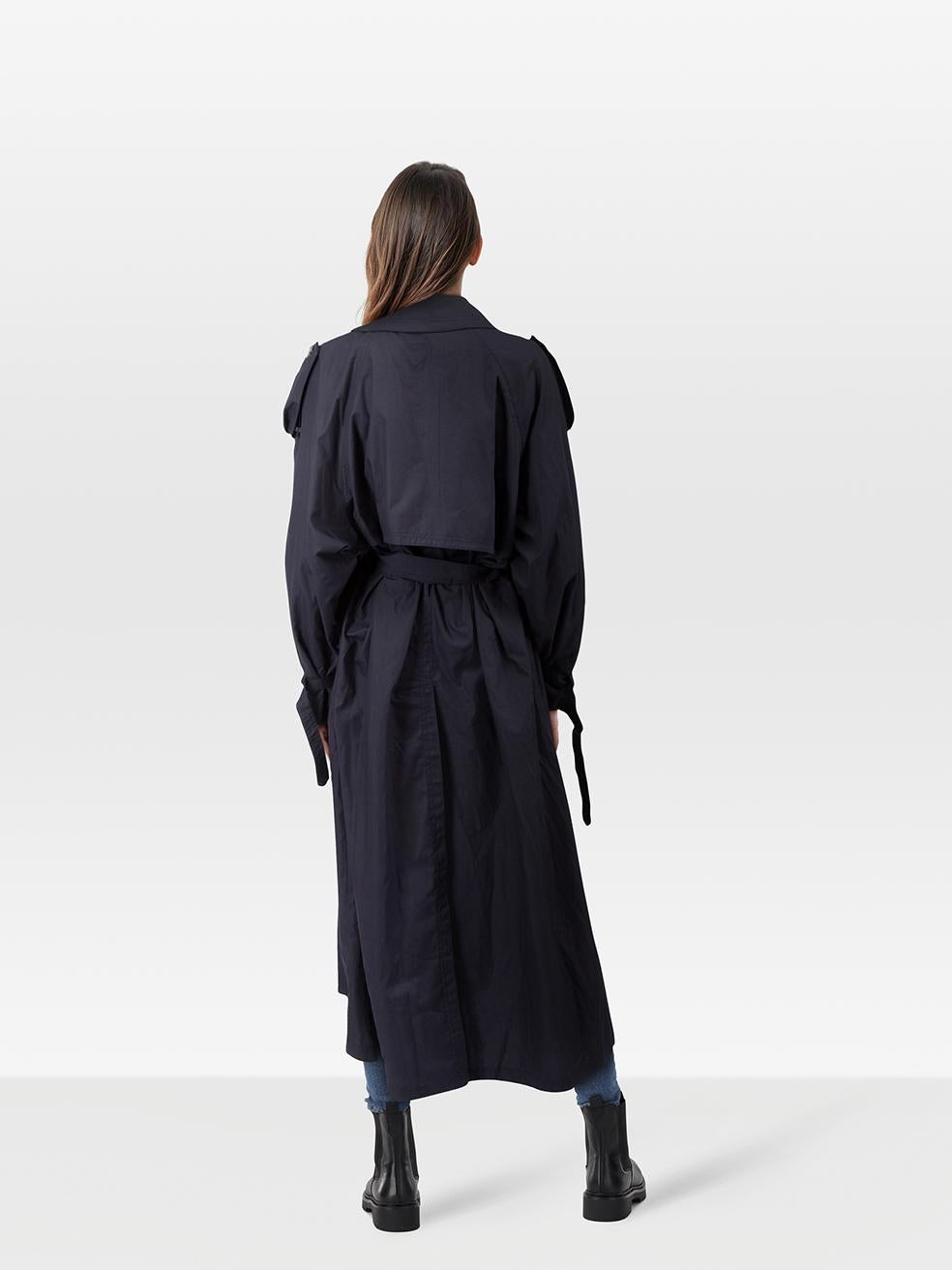 CONDITION is Very good. Minimal wear to the coat is evident. Mark on the left shoulder on this used Saint Laurent designer resale item. Mark may need gentle hand wash contrary to dry clean instructions.
 
 Details
 
 
 Navy¬†
 
 Polyester
 
 Trench