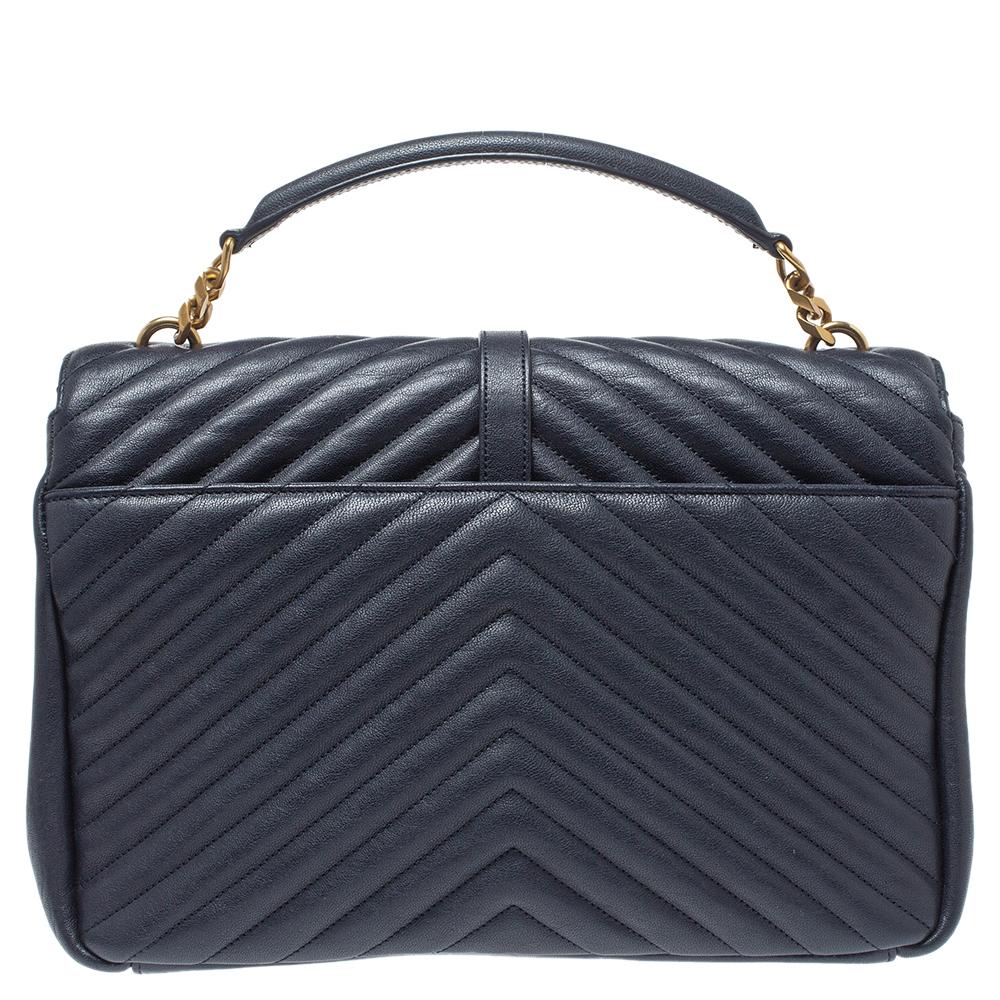 Elevate your everyday looks with this reliable Matelasse-quilted bag by Saint Laurent. It is crafted from quality leather in a navy blue hue. It features the YSL logo in gold-tone on the front flap, and the bag is designed fabulously. The flap opens