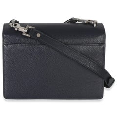 Saint Laurent – Mittelgroße „Monogram Sunset“-Tasche aus genarbtem Kalbsleder in Marineblau