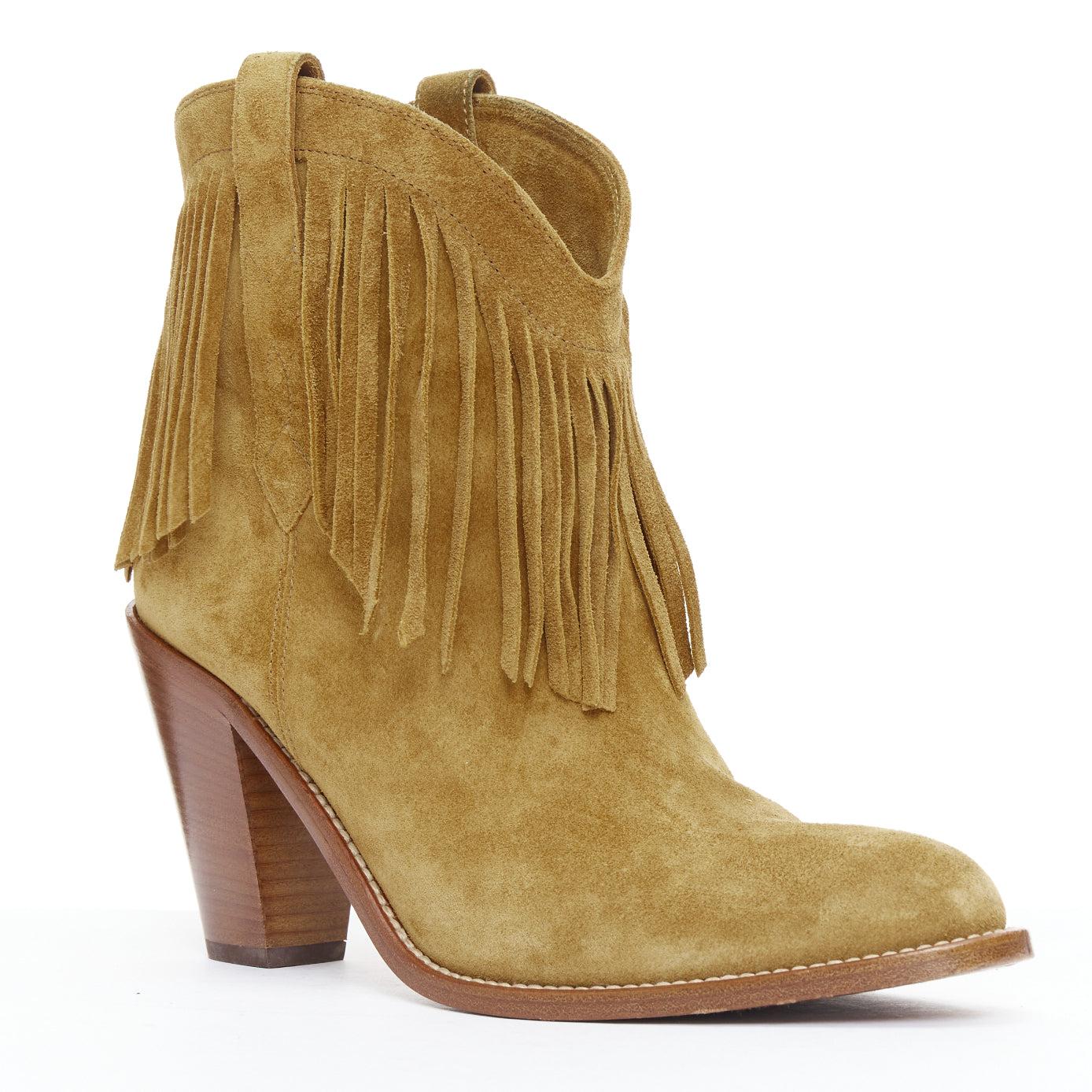 SAINT LAURENT New Western 80 brown suede fringe western boots EU39.5
Reference: JHDN/A00029
Brand: Saint Laurent
Designer: Anthony Vaccarello
Model: New Western 80
Material: Suede
Color: Brown
Pattern: Solid
Closure: Slip On
Lining: Brown