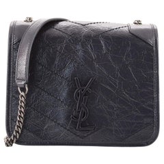 Saint Laurent Niki Brieftasche Matelasse aus Chevron-Leder mit Kette