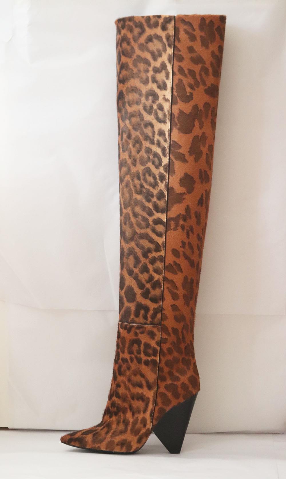 Saint Laurent's 'Niki' knee boots certainly possess the power to transform any look, they've been made in Italy from tactile calf hair lined with supple leather and set on slanted cone heels. Leopard-print calf hair. Pull on. Does not come with a