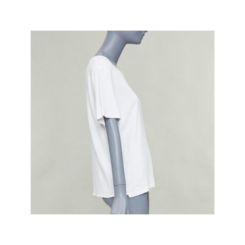 SAINT LAURENT off white cotton star embroidered cut out relaxed tshirt Pour femmes en vente