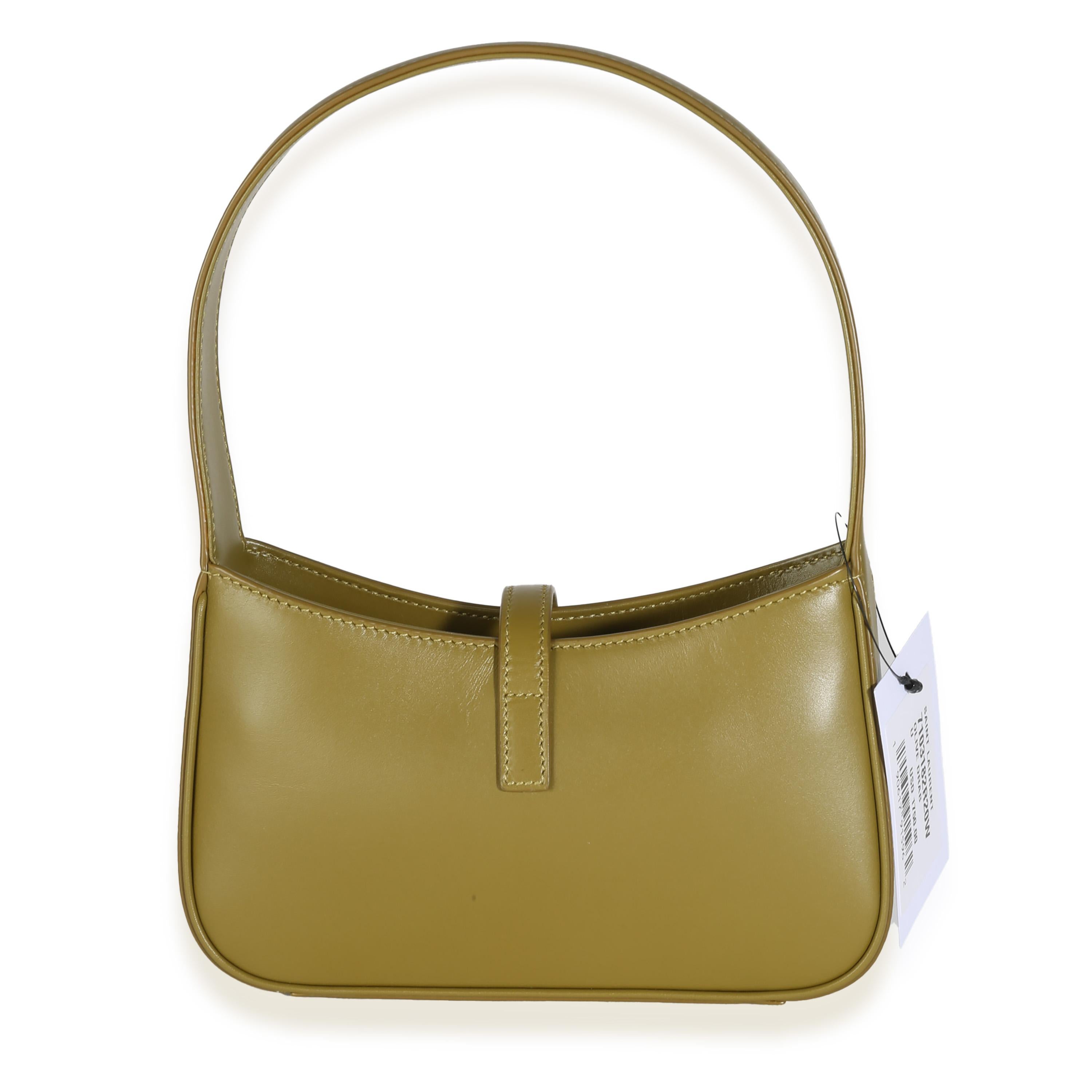 Listing Title: Saint Laurent Olive Smooth Calfskin Mini Le 5 À 7 Hobo
SKU: 142240
MSRP: 1750.00 USD
Condition: Pre-owned 
Handbag Condition: Excellent
Condition Comments: Item is in excellent condition and displays light signs of wear.   Faint