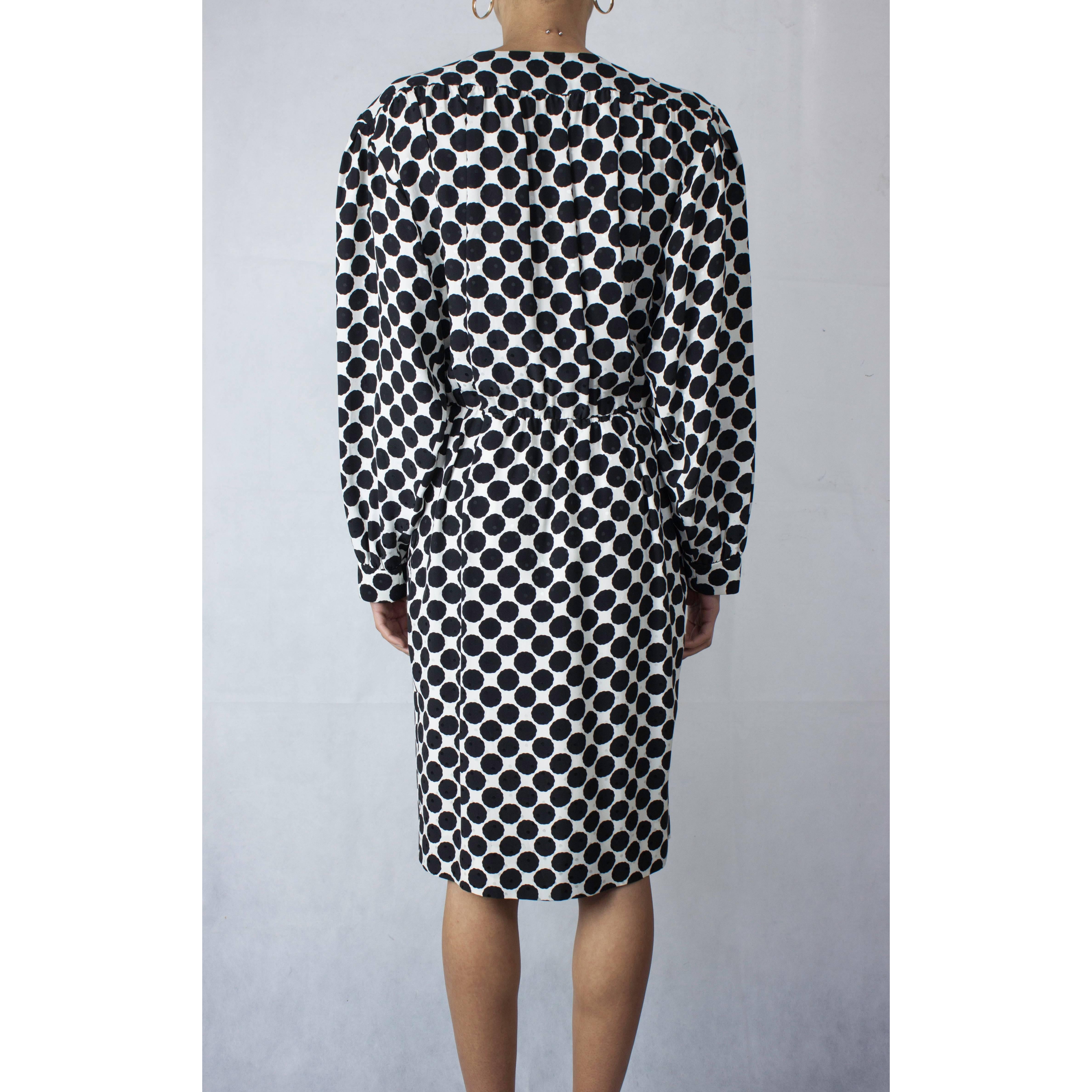 Black Saint Laurent opt art wraparound embossed silk dress with black dots, circa 1980 For Sale