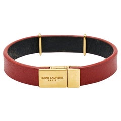 Saint Laurent, bracelet en cuir opyum de couleur or