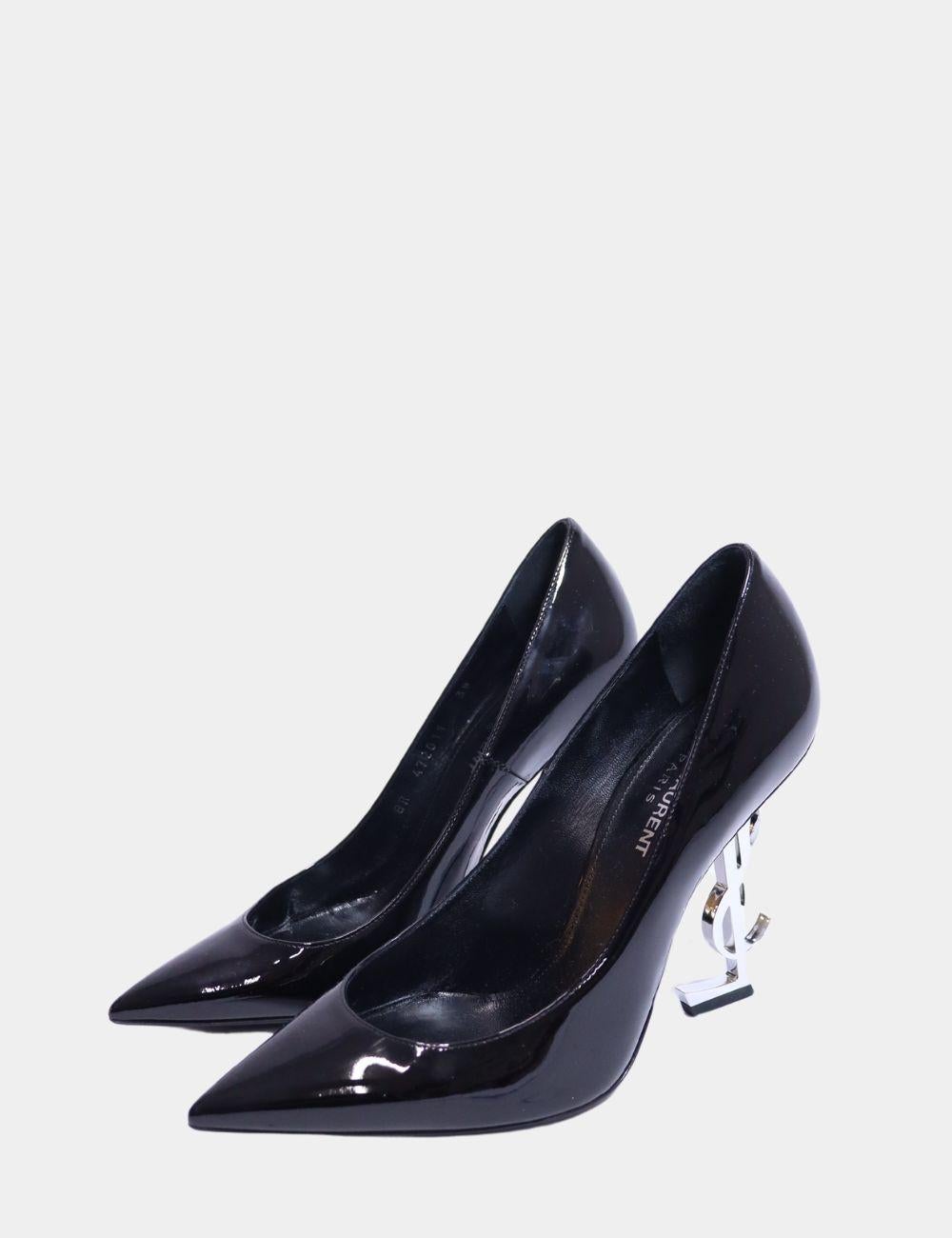 Saint Laurent Opyum Pumps, Features a pointed toe, low cut vamp, and 'YSL' logo shaped heels.

Material: Patent Leather
Size: EU 38
Heel: 11cm
Overall Condition: Excellent
Interior Condition: Signs of use
Exterior Condition: Light marks and scratches