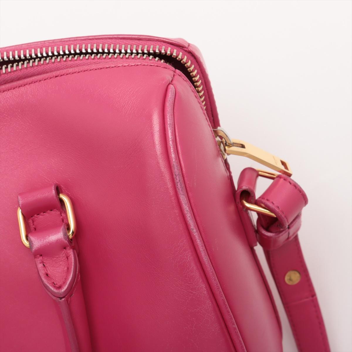 Saint Laurent Paris - Sac à main rose bigarré en cuir souple pour bébé 10