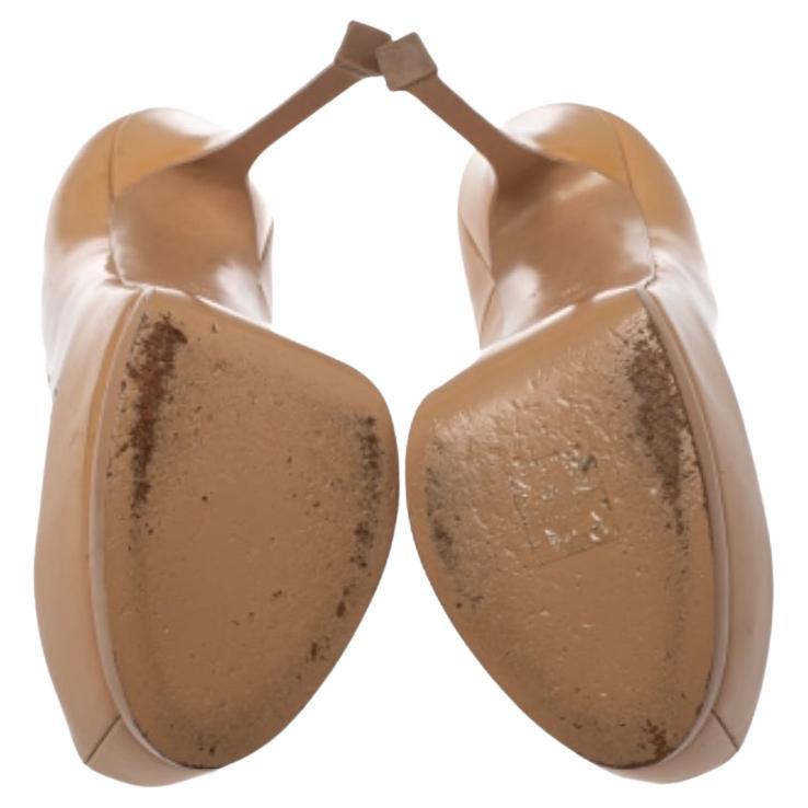 Saint Laurent Paris Bombas Tribtoo de charol beige Talla 39 en venta 2