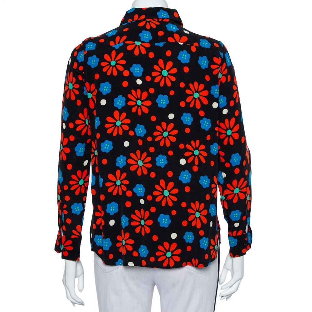 The house of Saint Laurent Paris brings to you this stylish shirt that is perfect for a host of events. It has been crafted from crepe and carries a lovely floral shirt in black. It has a collar, button front, long sleeves and a good fit.

