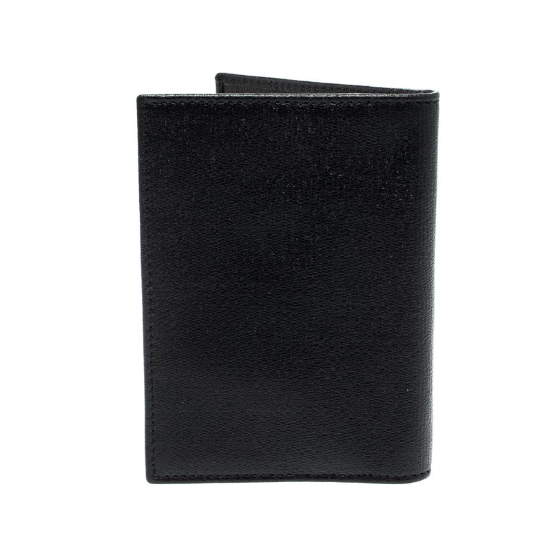 Indulge in a worthy buy by getting this bifold wallet from Saint Laurent Paris. It is crafted from leather and has multiple card slots and open compartments. It comes in a structured shape which adds more to the design of the wallet.

Includes: