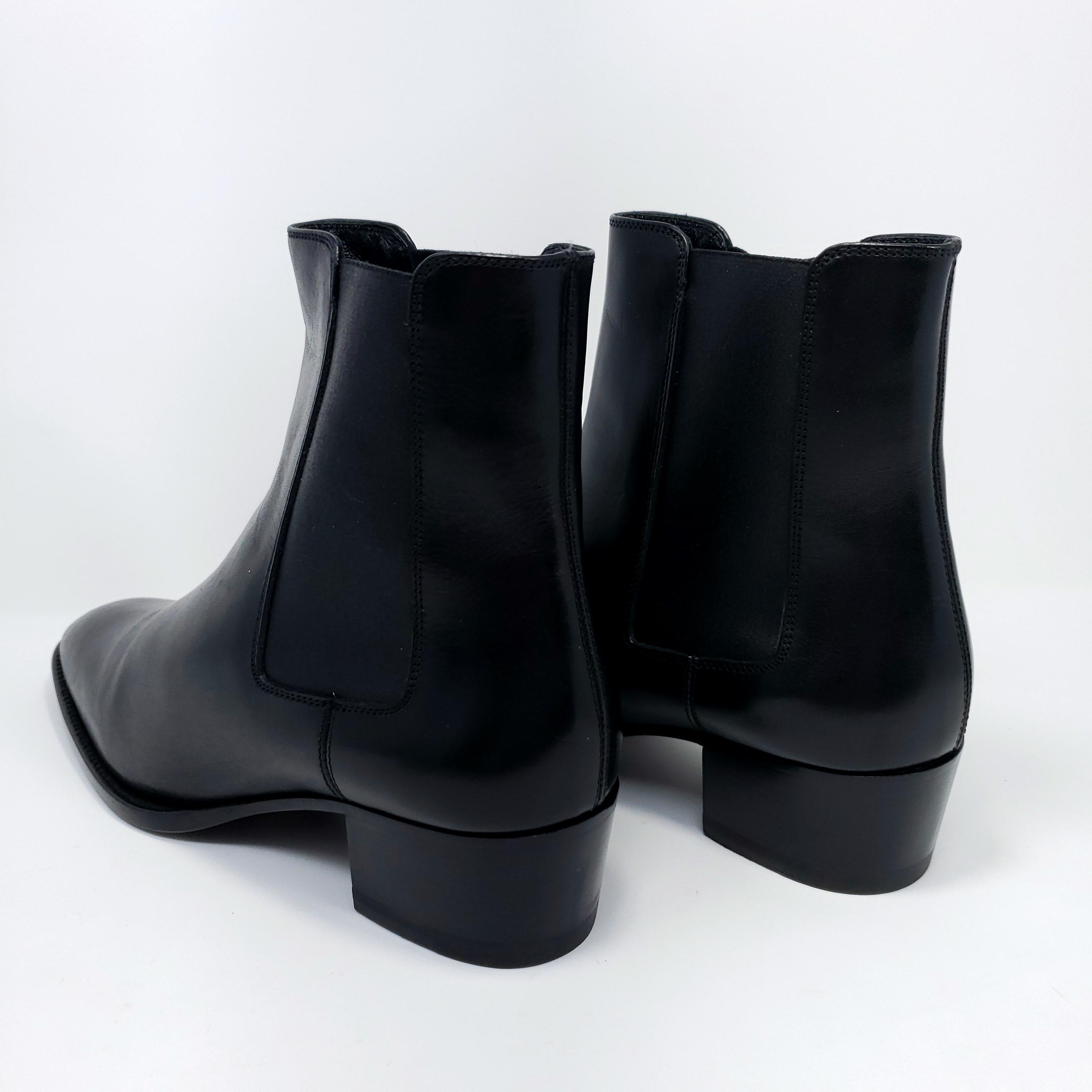 Iconic Saint Laurent Paris black leather chelsea boots.

EU Size 38. 

Leather upper and sole, made in Italy.

Gently worn once, excellent condition. Some natural wear on sole. Comes with original box.
